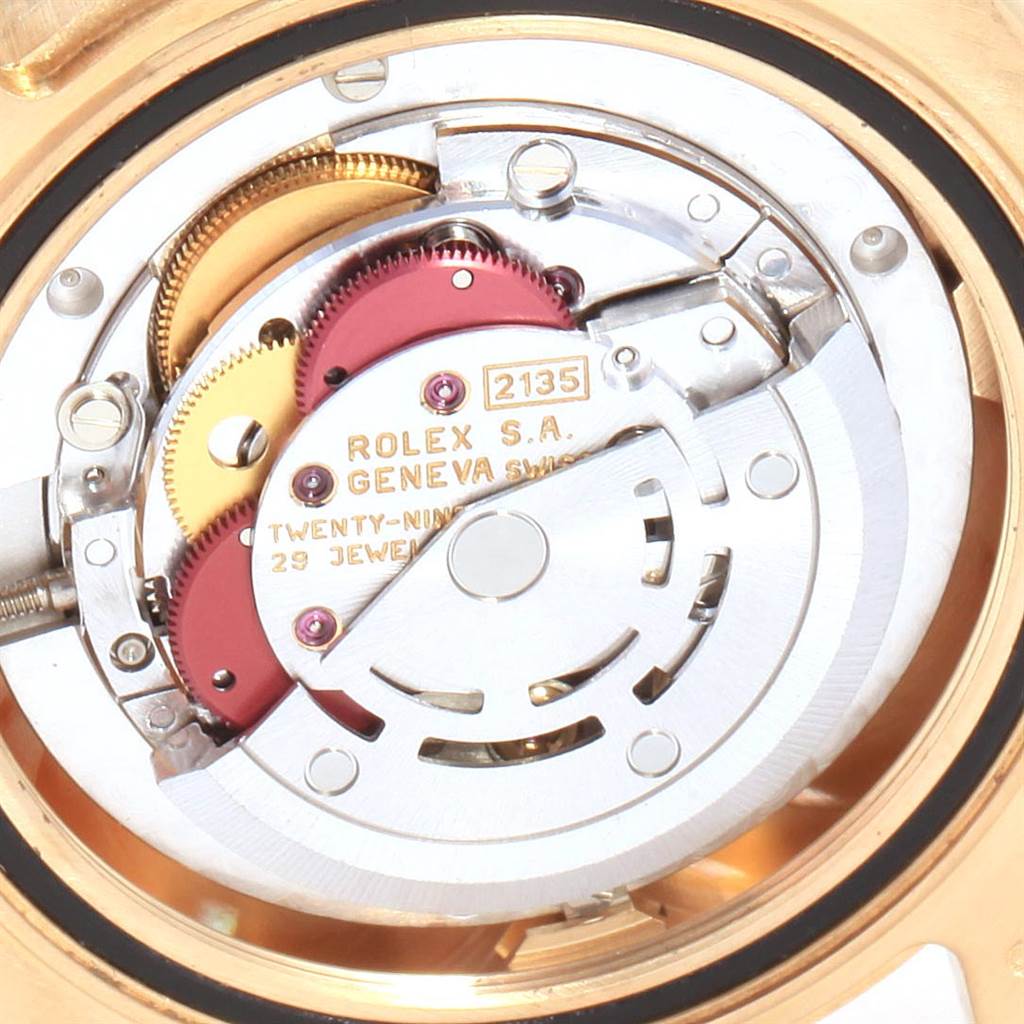 This image shows the internal mechanism of a Rolex Yacht-Master 68628 Yellow Gold Blue Dial 68628 Yellow Gold Blue Dial watch, including gears and the rotor, viewed from the back.