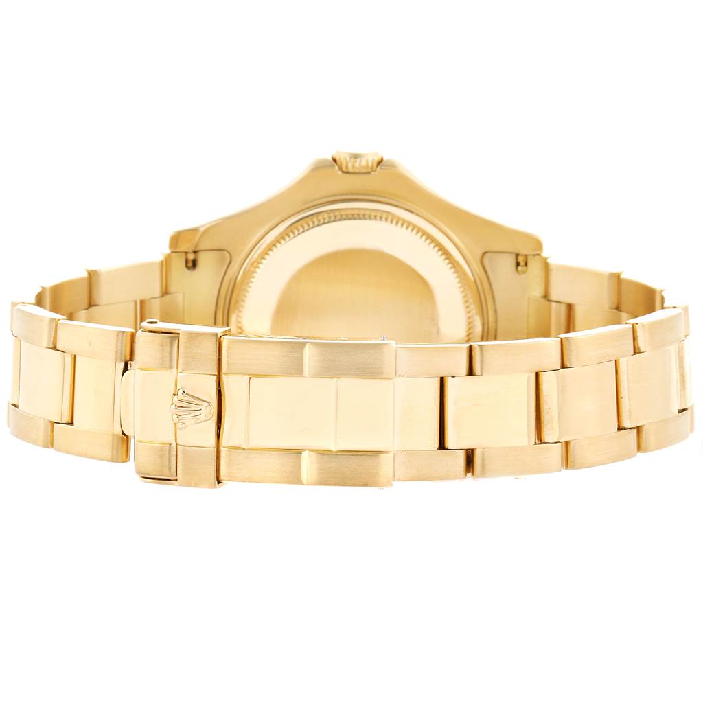 This image shows the back view of a Rolex Yacht-Master 68628 Yellow Gold Blue Dial 68628 Yellow Gold Blue Dial watch, focusing on its gold bracelet and clasp.