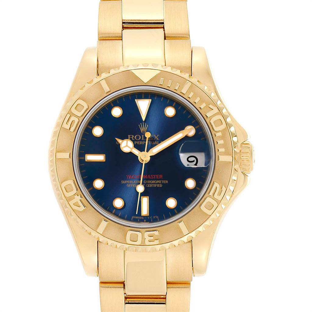 This image shows a frontal view of the Rolex Yacht-Master 68628 Yellow Gold Blue Dial 68628 Yellow Gold Blue Dial watch, highlighting its gold case, blue dial, and bracelet.