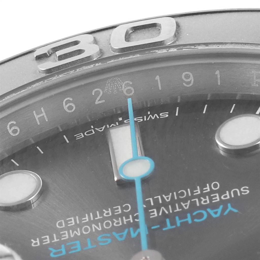 This close-up shot of the Rolex Yacht-Master 116622 Men's Stainless Steel Grey Dial 116622 Men's Stainless Steel Grey Dial watch shows part of the dial, a section of the bezel with "30", and a portion of the second hand.