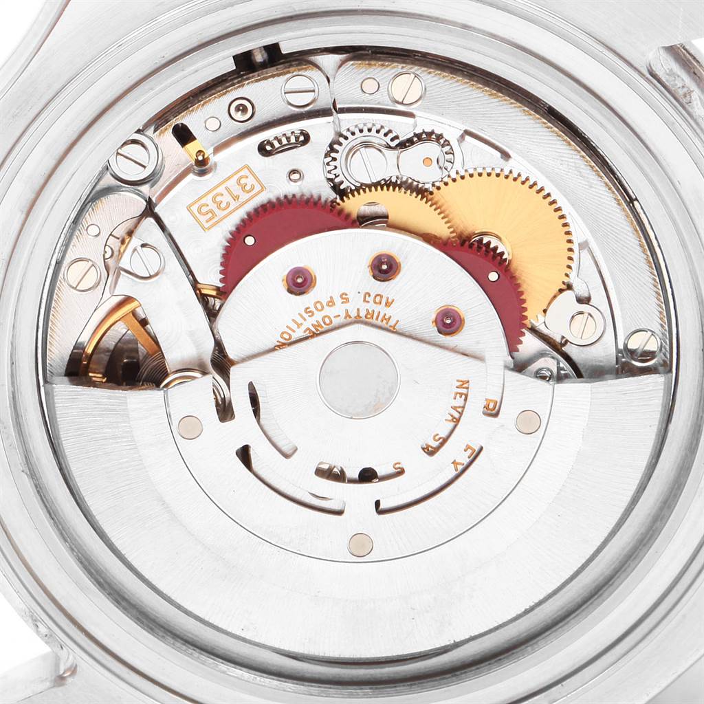 The image shows the internal mechanics of a Rolex Yacht-Master 16622 Men's Stainless Steel Silver Dial 16622 Men's Stainless Steel Silver Dial watch from a rear angle, highlighting gears and movement parts.
