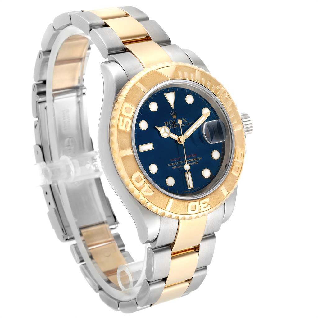 The image shows a Rolex Yacht-Master 16623 Men's Stainless Steel Blue Dial 16623 Men's Stainless Steel Blue Dial watch at an angled side view, displaying its two-tone bracelet, blue dial, and gold bezel.