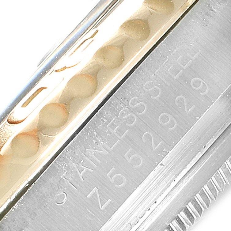 This close-up image shows part of the bezel and case of a Rolex Yacht-Master 16623 Men's Stainless Steel Blue Dial 16623 Men's Stainless Steel Blue Dial watch, highlighting its stainless steel material.