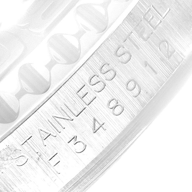 The image shows a close-up of the bezel engravings and part of the metal band of the Rolex Yacht-Master 16622 Men's Stainless Steel Silver Dial 16622 Men's Stainless Steel Silver Dial watch.