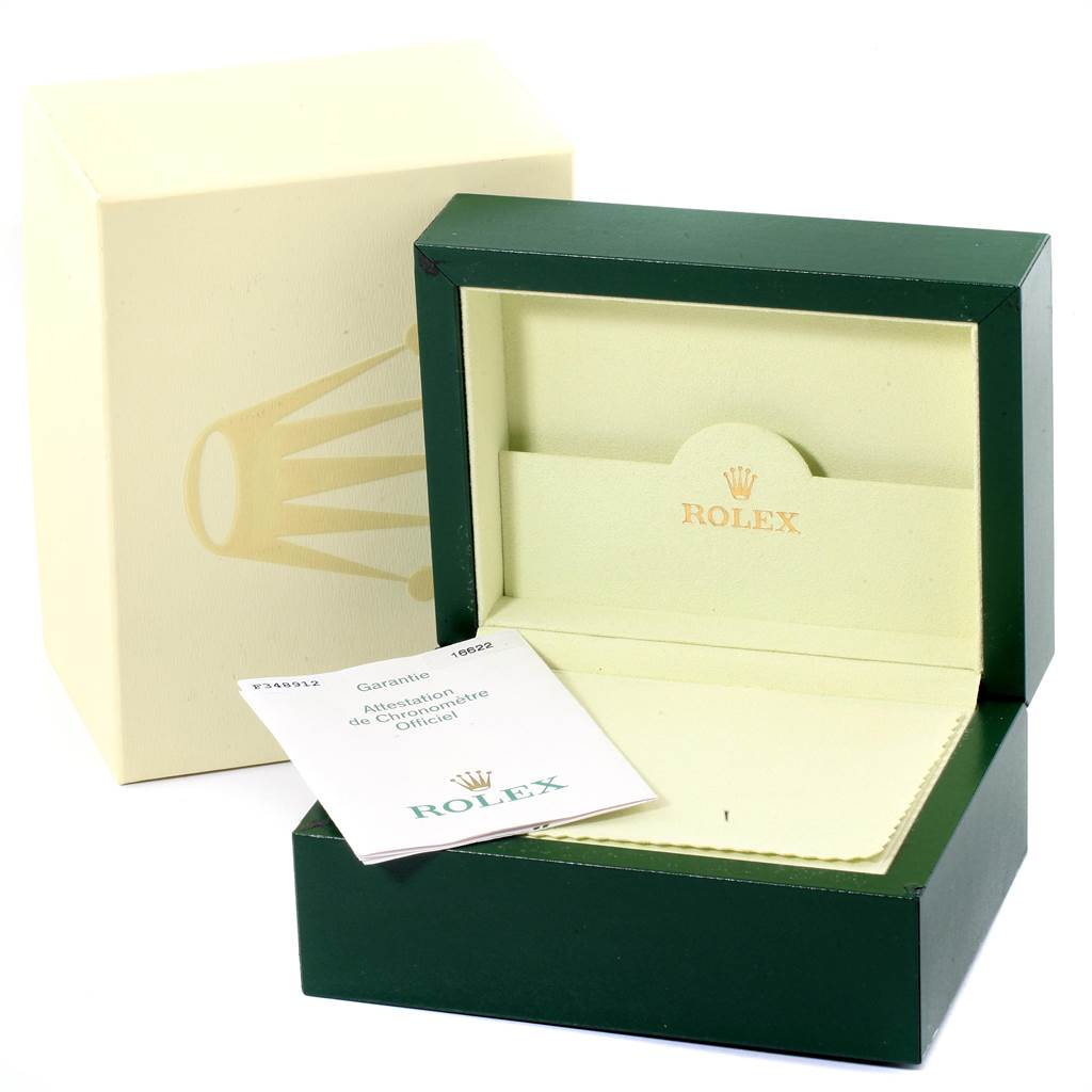 The image shows the open green and beige box for a Rolex Yacht-Master 16622 Men's Stainless Steel Silver Dial 16622 Men's Stainless Steel Silver Dial watch, along with warranty cards.