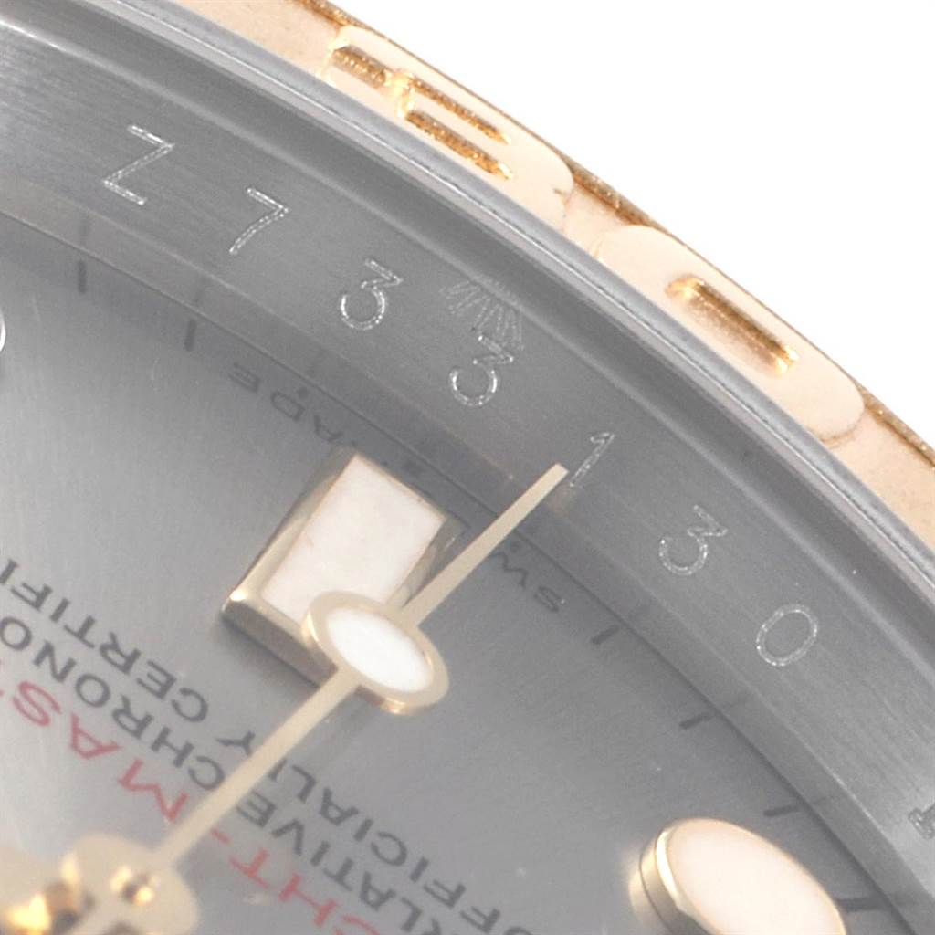 The image shows a close-up of the Rolex Yacht-Master 16623 Men's Steel and Gold (two tone) Grey Dial 16623 Men's Steel and Gold (two tone) Grey Dial watch's dial, including the hands, markers, and part of the bezel.
