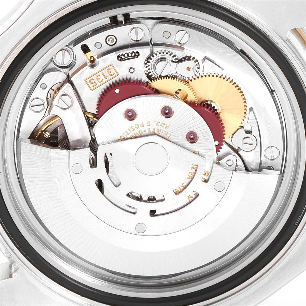 This image shows a close-up of the movement parts inside a Rolex Yacht-Master 16623 Men's Steel and Gold (two tone) Grey Dial 16623 Men's Steel and Gold (two tone) Grey Dial watch from a rear view.