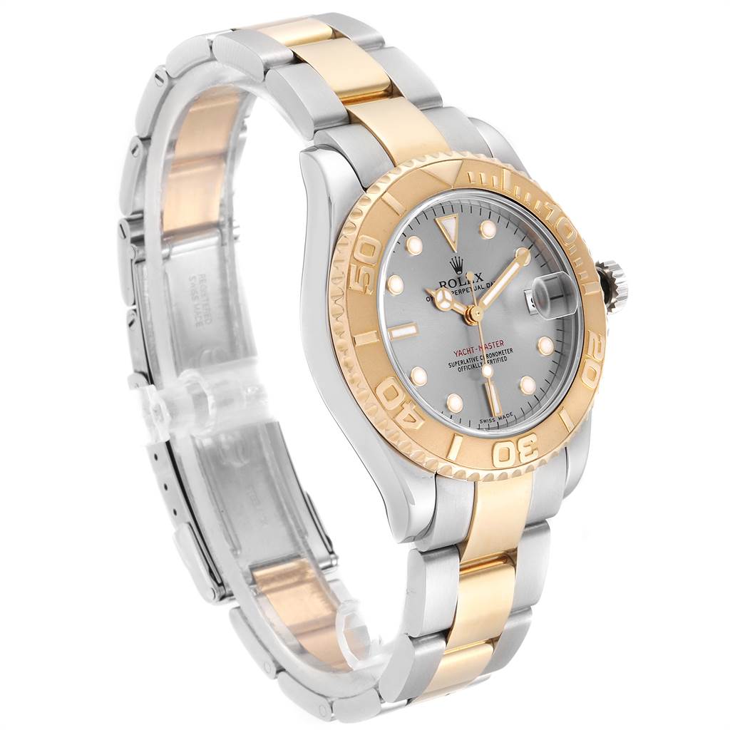 The Rolex Yacht-Master 168623 Men
s Steel and Gold (two tone) Grey Dial 168623 Men
s Steel and Gold (two tone) Grey Dial watch is shown from a three-quarter angle, highlighting its face, bezel, crown, and bracelet.
