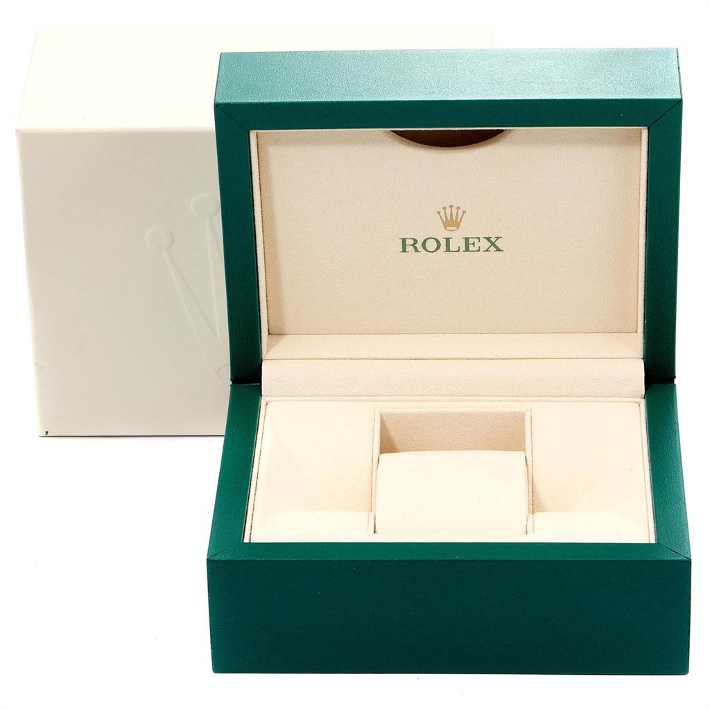 The image shows an open Rolex Yacht-Master 116622 Men's Stainless Steel Blue Dial 116622 Men's Stainless Steel Blue Dial watch box, revealing a cushioned area for the watch.
