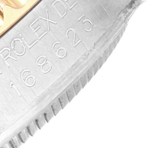 Close-up of the side of a Rolex Yacht-Master 168623 Men's Steel and Gold (two tone) Blue Dial 168623 Men's Steel and Gold (two tone) Blue Dial watch, showing the engraved model number 168623.