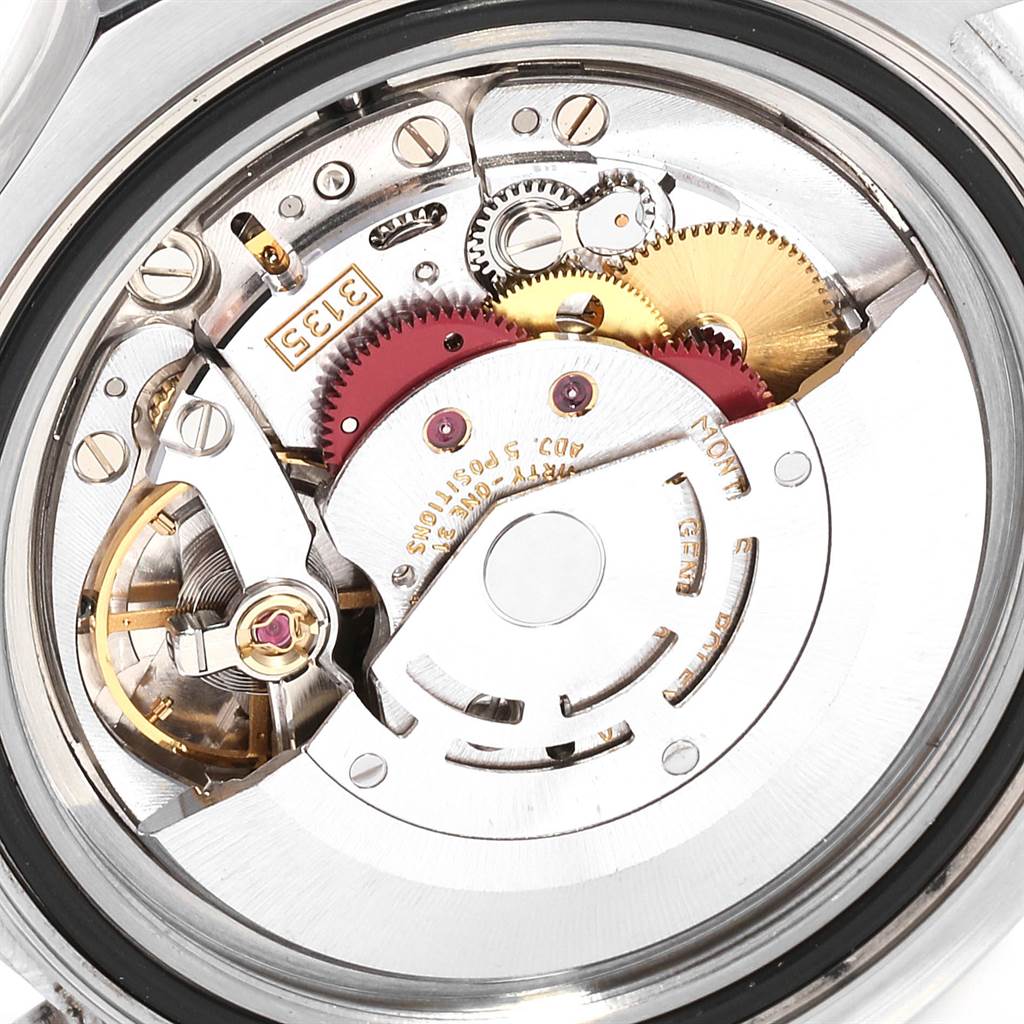 The image shows the intricate internal mechanism of a Rolex Yacht-Master 16622 Men's Stainless Steel Silver Dial 16622 Men's Stainless Steel Silver Dial watch from an angled view focusing on the movement components.