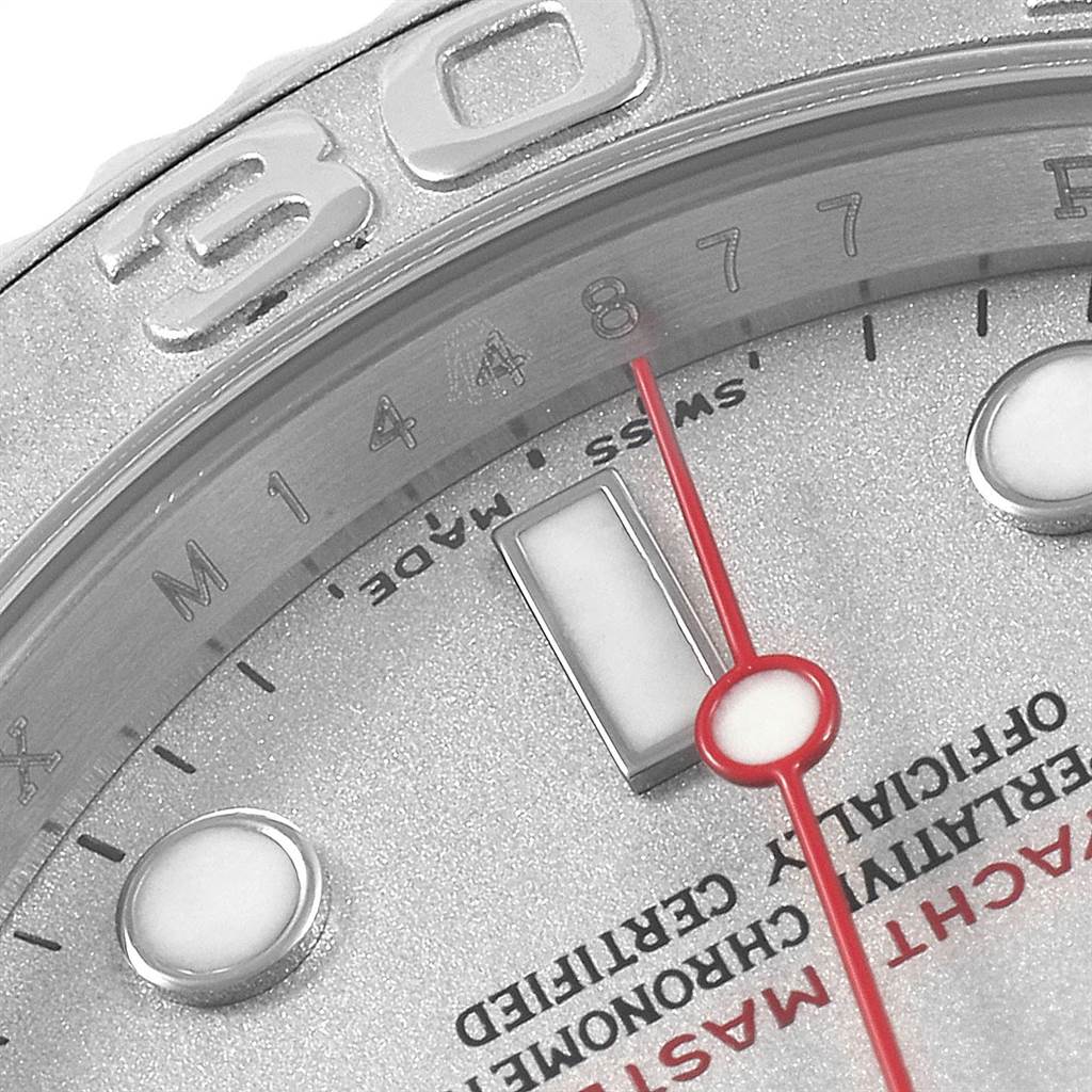 This close-up of the Rolex Yacht-Master 16622 Men's Stainless Steel Silver Dial 16622 Men's Stainless Steel Silver Dial watch shows part of the dial, the bezel with numerals, and the minute hand.