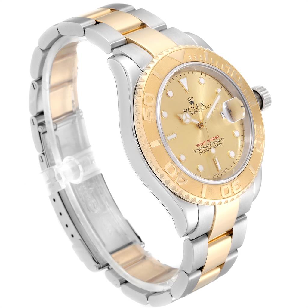The Rolex Yacht-Master 16623 Men's Stainless Steel Champagne Dial 16623 Men's Stainless Steel Champagne Dial watch is shown at an angle highlighting its dial, bezel, and two-tone bracelet.