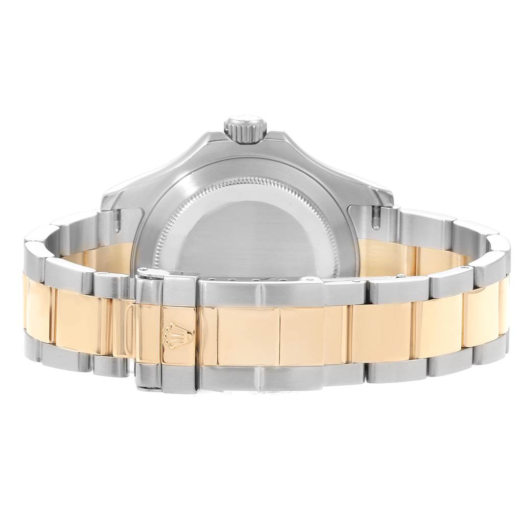 The image shows the back view of a Rolex Yacht-Master 16623 Men's Stainless Steel Champagne Dial 16623 Men's Stainless Steel Champagne Dial, highlighting the case back and the gold and silver two-tone bracelet.