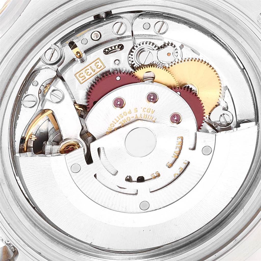 This image shows the intricate internal mechanism and gears of the Rolex Yacht-Master 16623 Men's Stainless Steel Champagne Dial 16623 Men's Stainless Steel Champagne Dial watch, taken from the back.