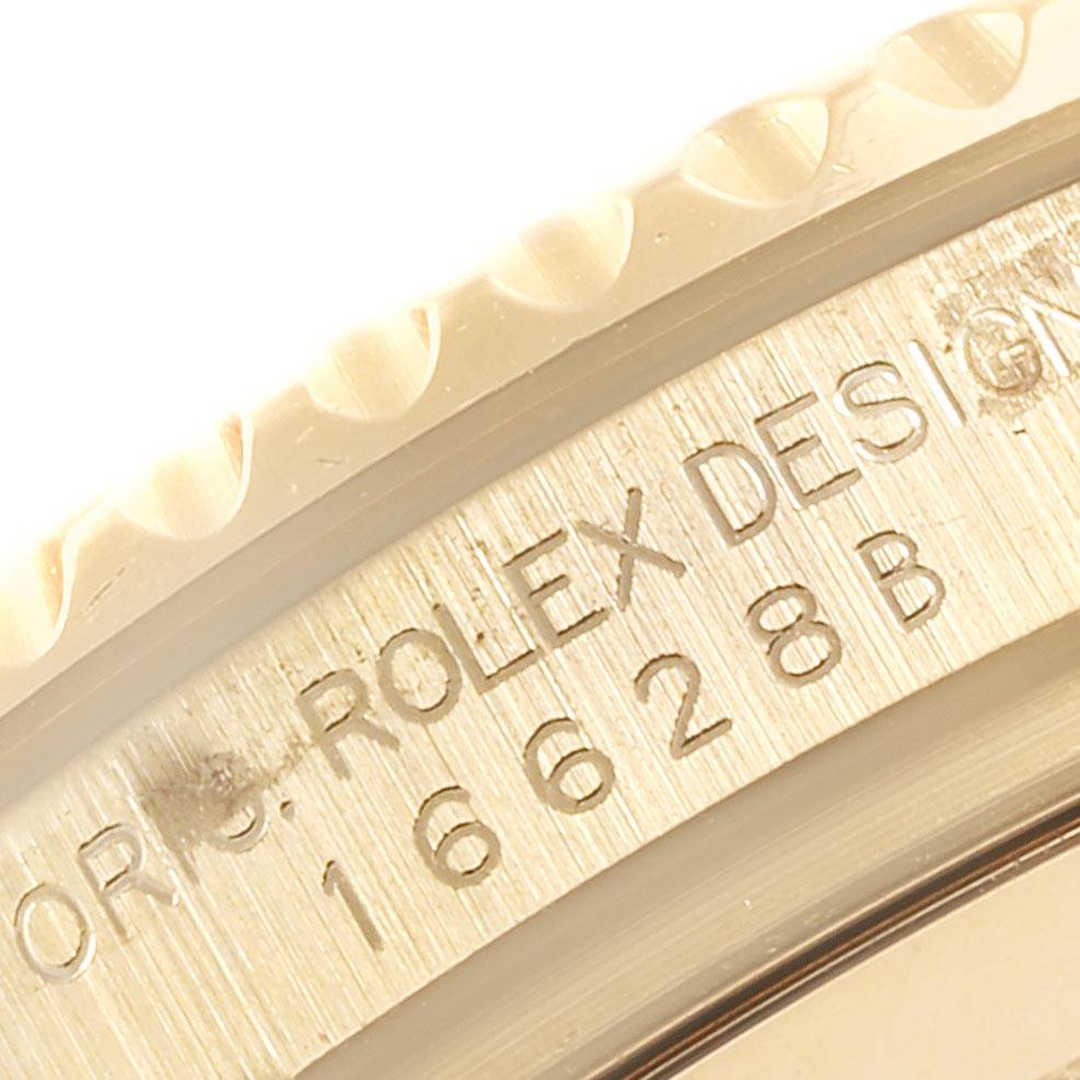 The image shows a close-up of the bezel with part of the model number and "Rolex Design" engraved on the Yacht-Master by Rolex.