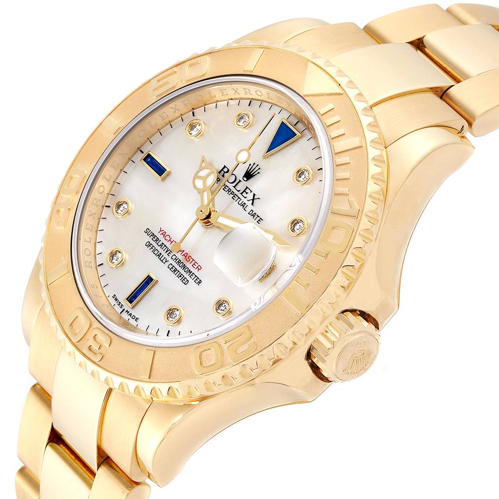The Rolex Yacht-Master 16628 Men
s Yellow Gold Mother of Pearl Dial 16628 Men
s Yellow Gold Mother of Pearl Dial watch is shown at an angled view, highlighting its gold bezel, crown, and part of the bracelet.