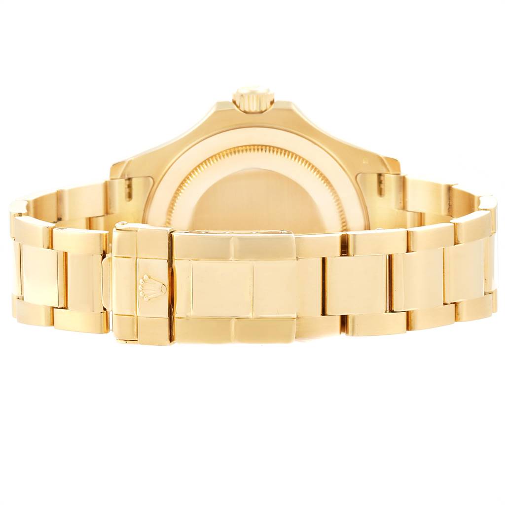 The image shows the back side and bracelet of a Rolex Yacht-Master 16628 Men
s Yellow Gold Mother of Pearl Dial 16628 Men
s Yellow Gold Mother of Pearl Dial watch, highlighting the clasp and case back.