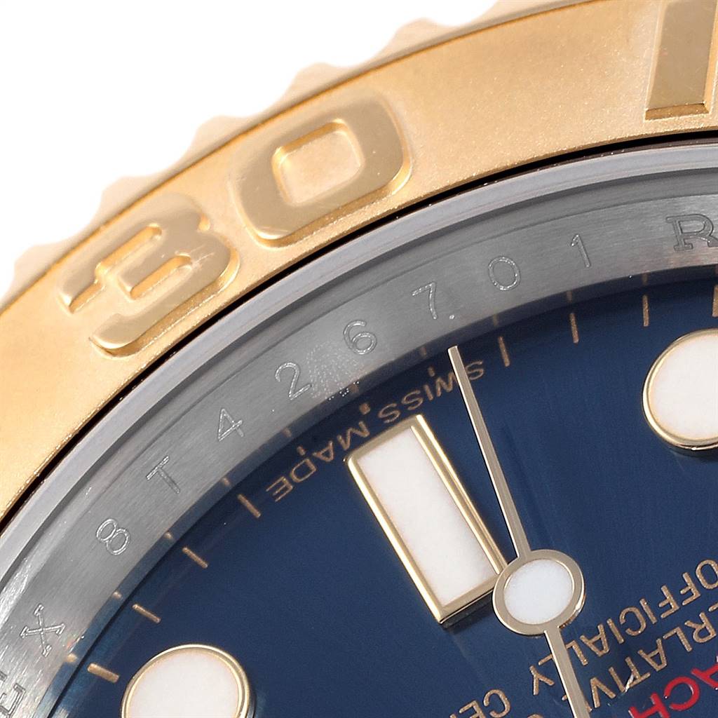 The close-up image shows the bezel and part of the dial of a Rolex Yacht-Master 16623 Men's Stainless Steel Blue Dial 16623 Men's Stainless Steel Blue Dial watch.