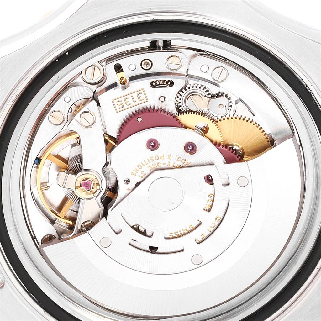 The image shows the intricate inner mechanism of the Rolex Yacht-Master 16623 Men's Stainless Steel Grey Dial 16623 Men's Stainless Steel Grey Dial watch from a close-up, angled from the back with the case open.