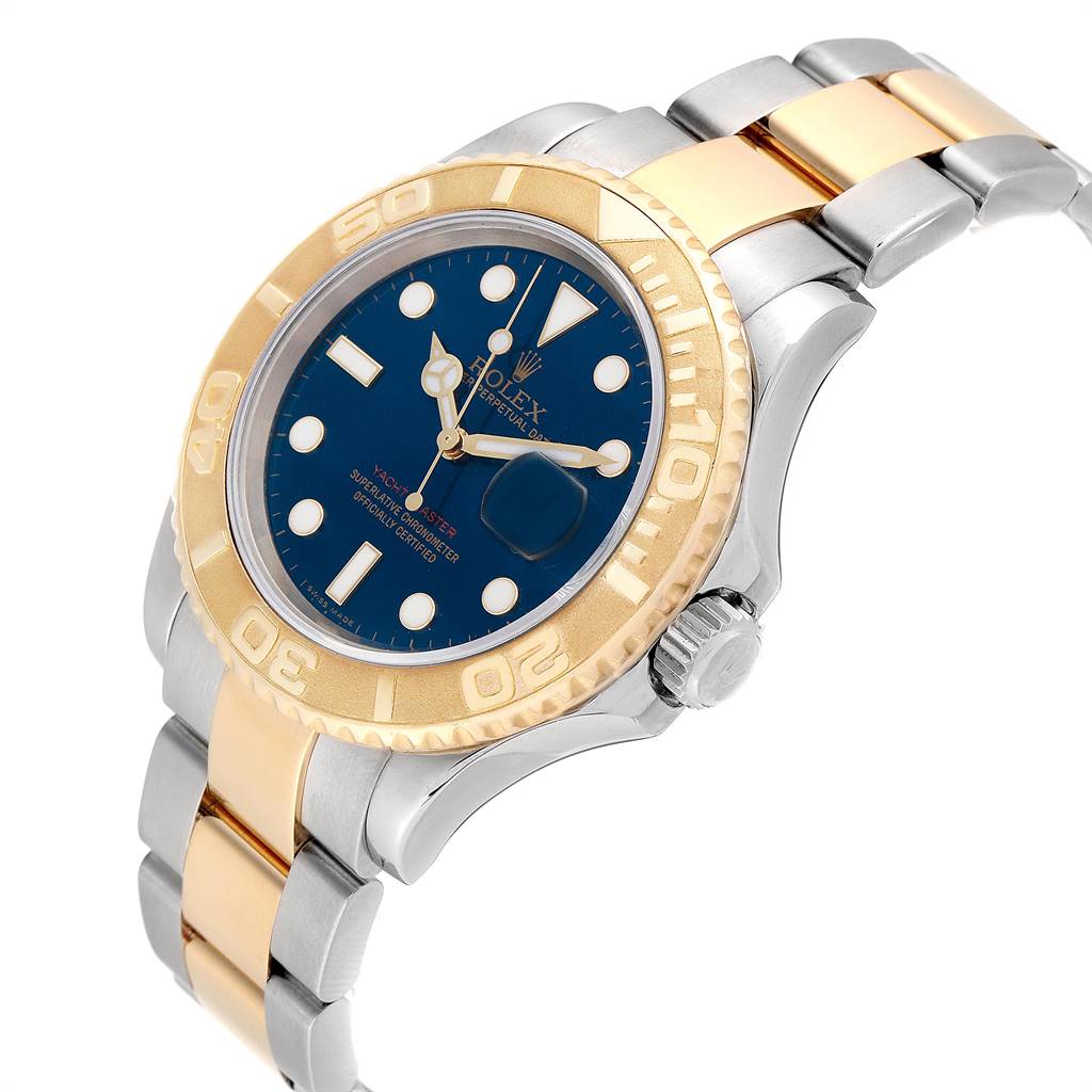 The image shows a Rolex Yacht-Master 16623 Men's Stainless Steel Blue Dial 16623 Men's Stainless Steel Blue Dial watch from an angle revealing the bezel, face, crown, and part of the bracelet.