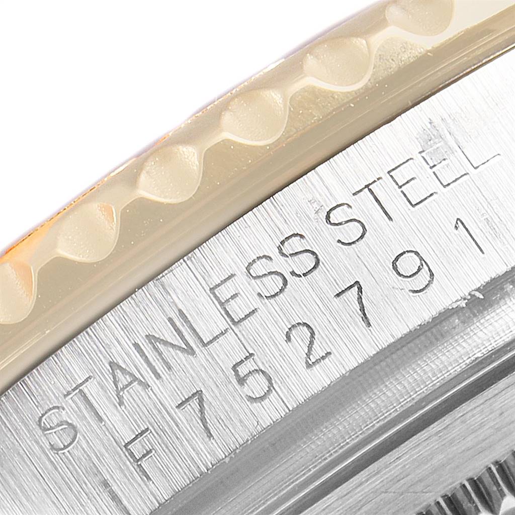 This close-up image shows the engraving on the stainless steel case of a Rolex Yacht-Master 16623 Men
s Stainless Steel Grey Dial 16623 Men
s Stainless Steel Grey Dial watch.