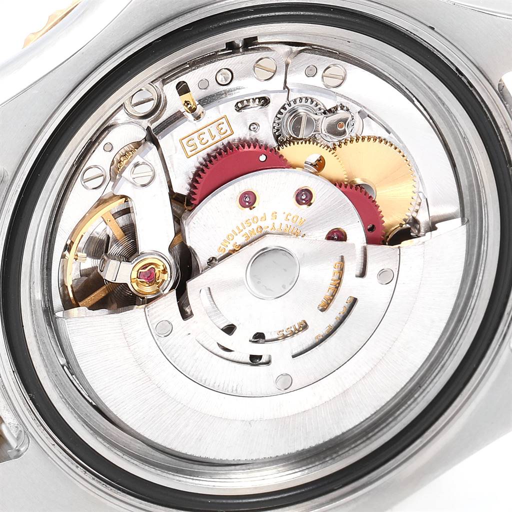 This image shows a close-up of the movement and internal mechanics of a Rolex Yacht-Master 16623 Men
s Stainless Steel Grey Dial 16623 Men
s Stainless Steel Grey Dial watch.