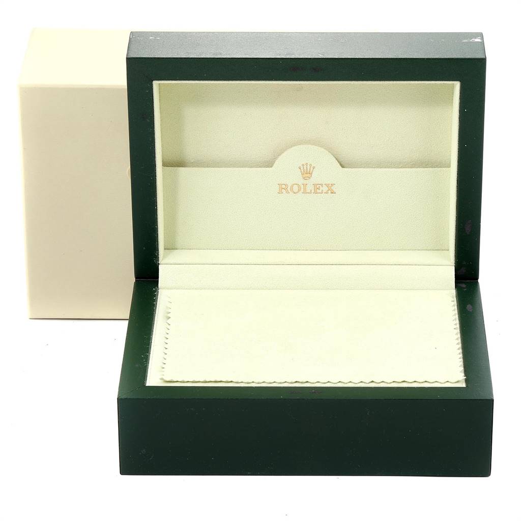 This image shows an open Rolex watch box from a Yacht-Master model, along with a cloth inside.