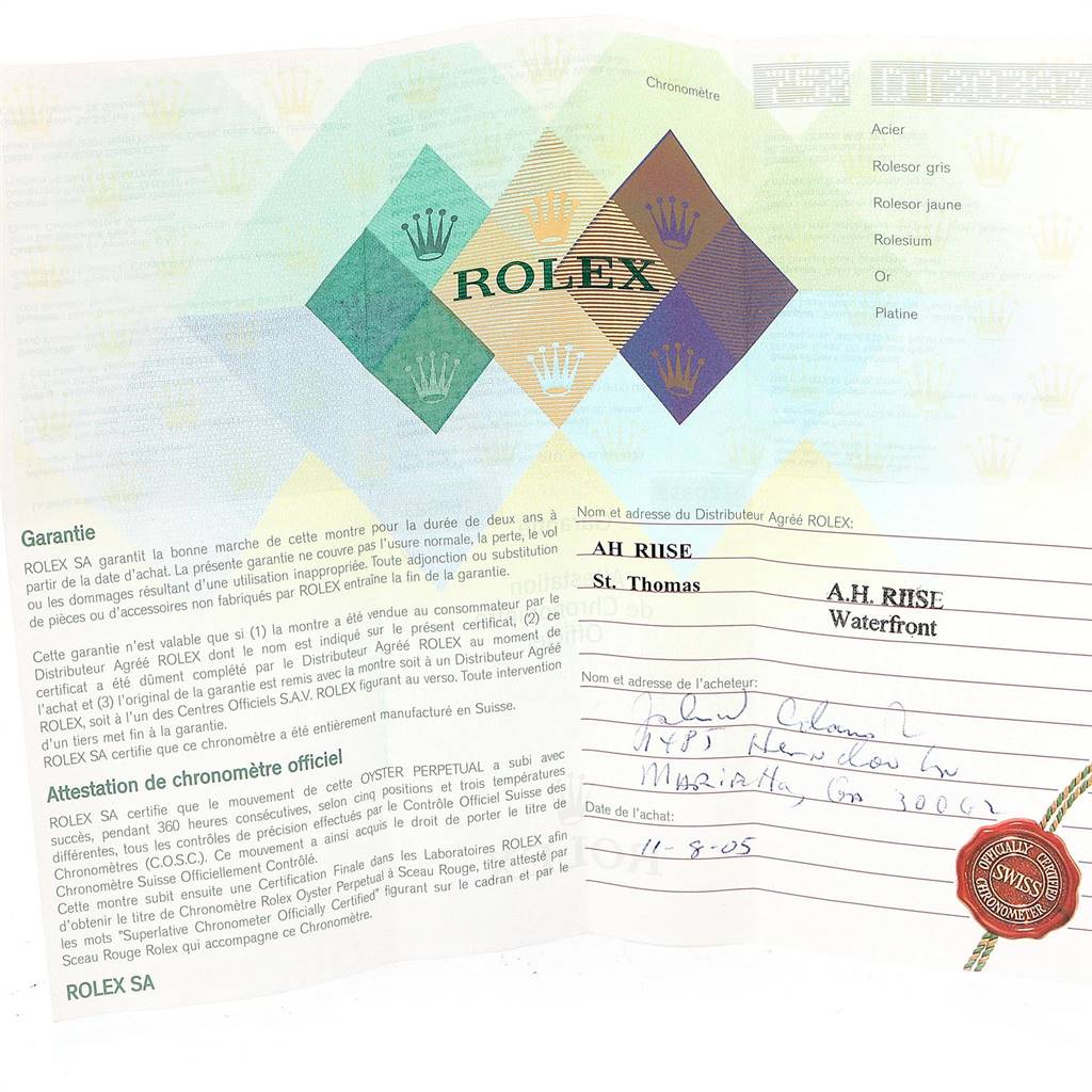 This image shows the warranty card and certificate for a Rolex Yacht-Master 168623 Men's Steel and Gold (two tone) White Dial 168623 Men's Steel and Gold (two tone) White Dial watch.