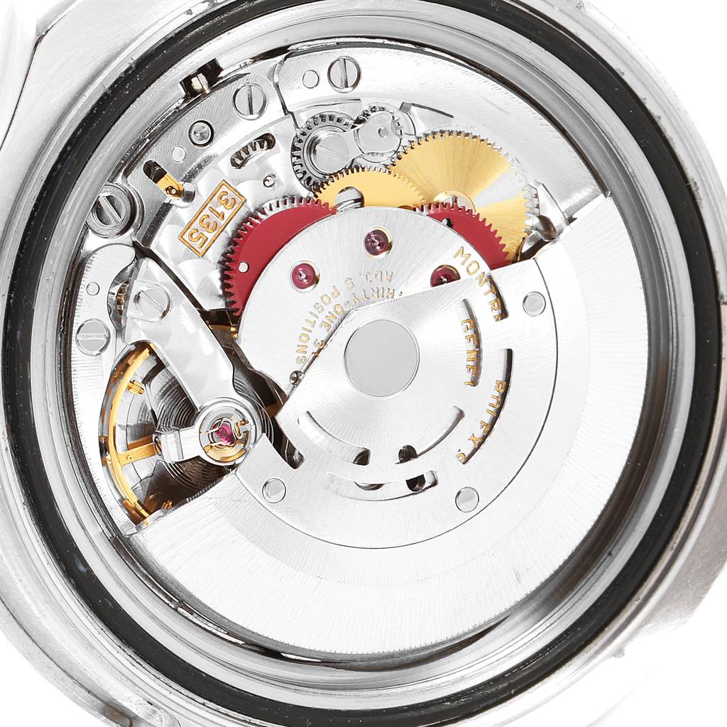 The image shows a close-up of the inner mechanical movement parts of the Rolex Yacht-Master 16622 Men
s Stainless Steel Silver Dial 16622 Men
s Stainless Steel Silver Dial watch.