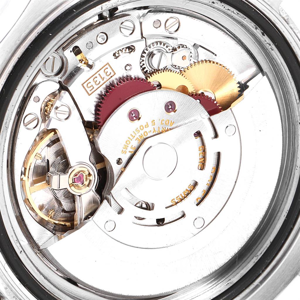 This close-up image shows the intricate internal mechanism and gears of a Rolex Yacht-Master 16622 Men
s Stainless Steel Silver Dial 16622 Men
s Stainless Steel Silver Dial watch.