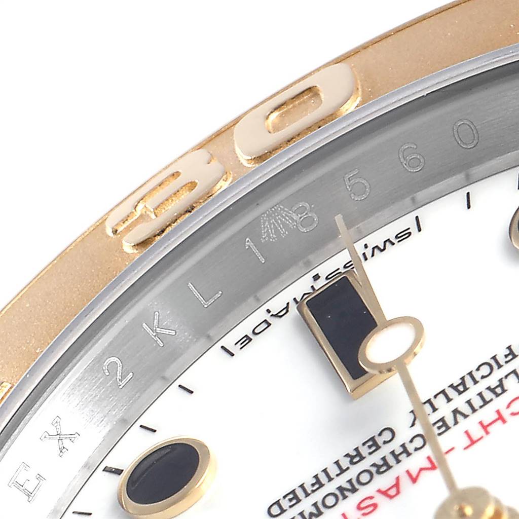 This image shows a close-up of the dial and part of the bezel of a Rolex Yacht-Master 16623 Men
s Stainless Steel White Dial 16623 Men
s Stainless Steel White Dial watch.