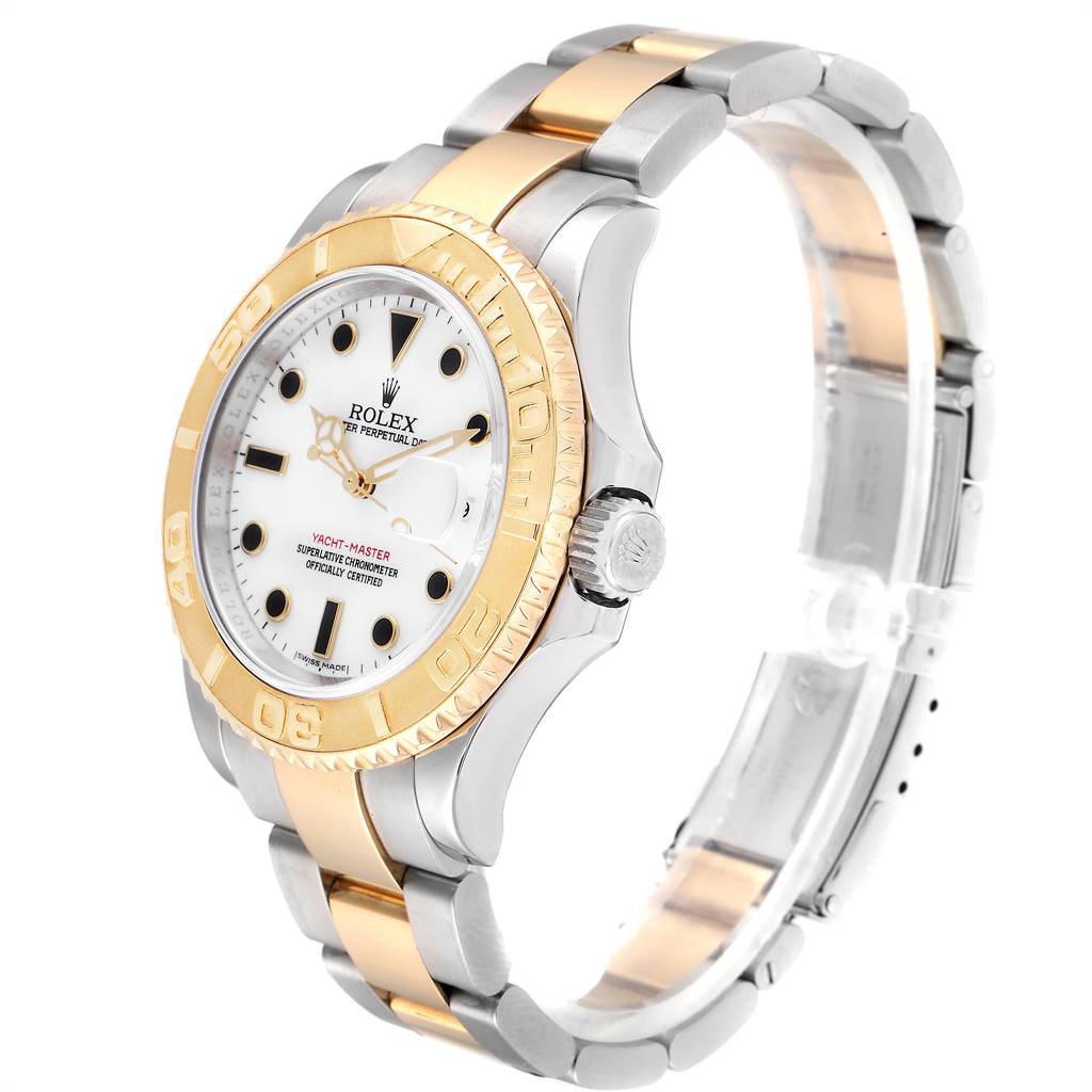 The Rolex Yacht-Master 16623 Men
s Stainless Steel White Dial 16623 Men
s Stainless Steel White Dial watch is shown at an angle highlighting the face, bezel, and partially extended two-tone bracelet.