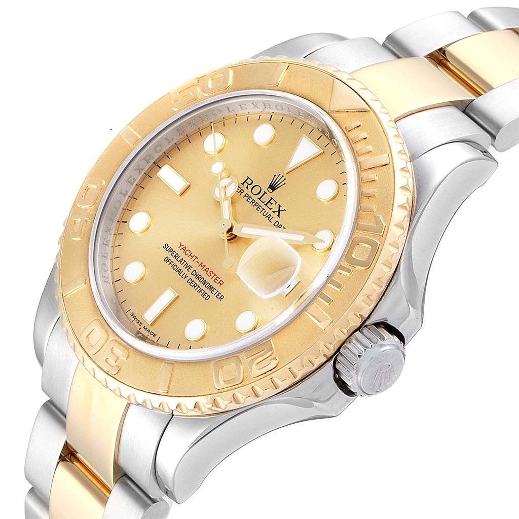 The image shows an angled view of a Rolex Yacht-Master 16623 Men's Stainless Steel Champagne Dial 16623 Men's Stainless Steel Champagne Dial watch, highlighting the gold bezel, dial, and crown.