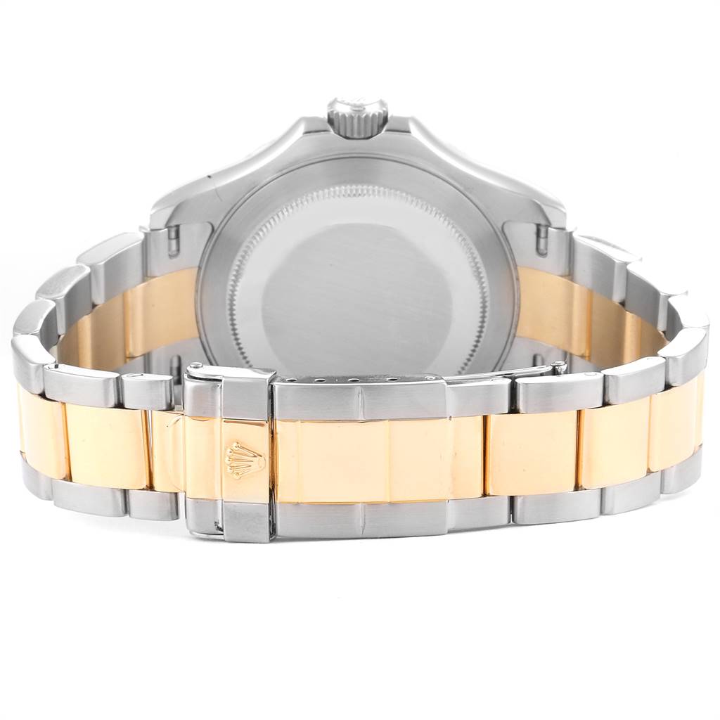 The image shows the back of a Rolex Yacht-Master 16623 Men's Stainless Steel Champagne Dial 16623 Men's Stainless Steel Champagne Dial watch, focusing on the case back and the bi-metal bracelet with a clasp.