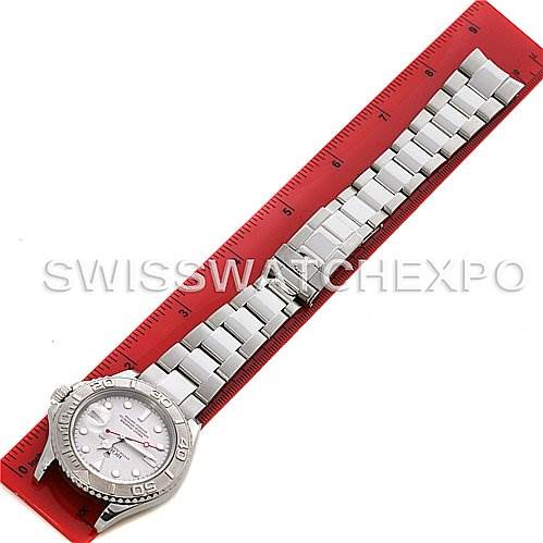 The image shows a Rolex Yacht-Master 16622 Men's Stainless Steel Silver Dial 16622 Men's Stainless Steel Silver Dial watch laid flat next to a red ruler, highlighting the bezel, dial, and bracelet.
