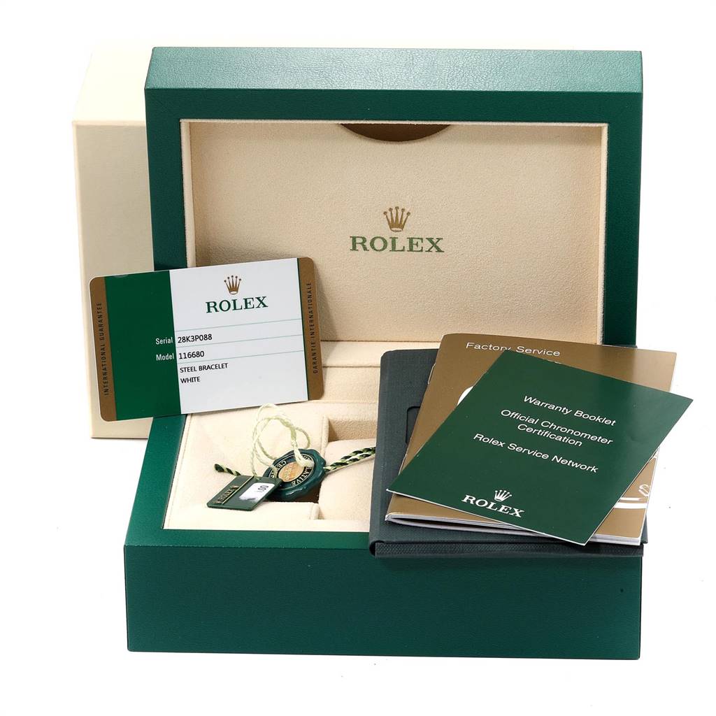 This image shows the packaging and accessories of the Rolex Yacht-Master 116680 Men
s Stainless Steel White Dial 116680 Men
s Stainless Steel White Dial, including the warranty card and booklets.
