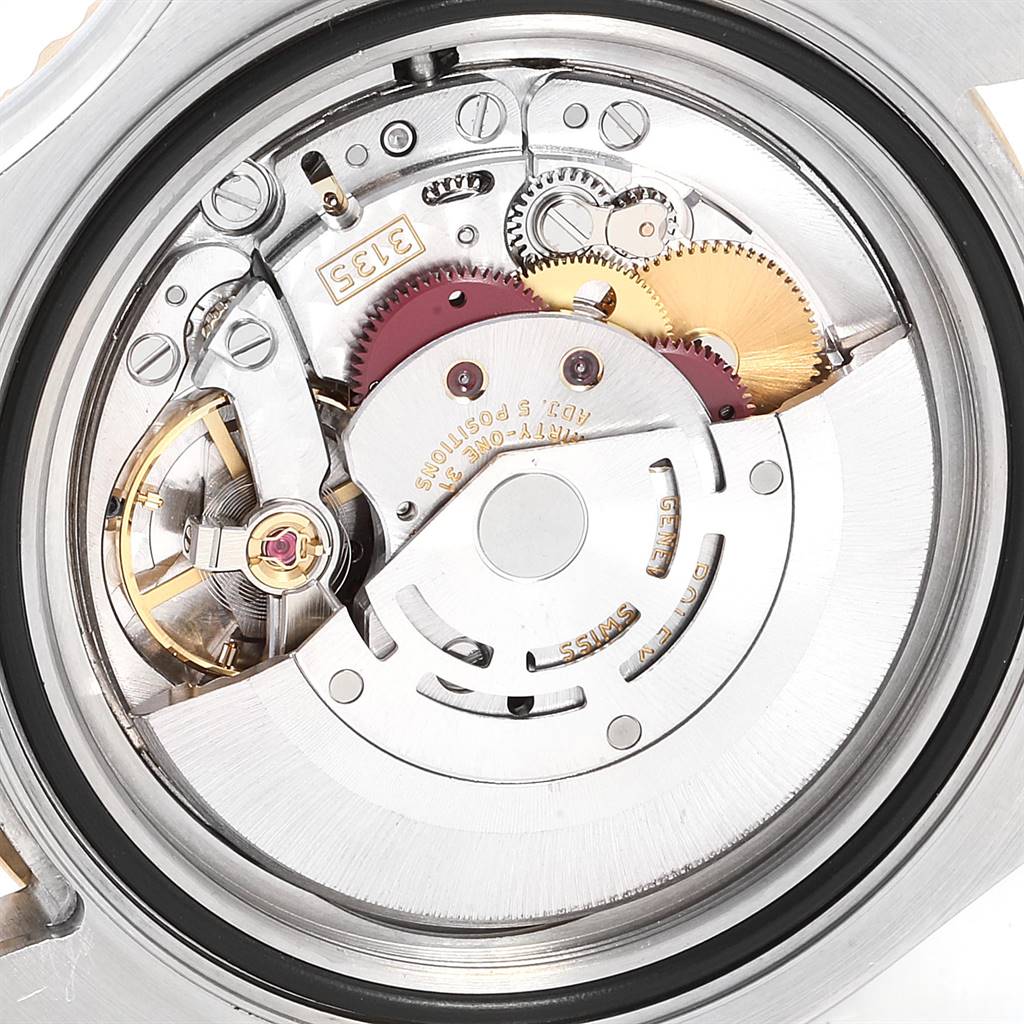 This image shows the intricate inner mechanical movement of a Rolex Yacht-Master 16623 Men's Stainless Steel Mother of Pearl Dial 16623 Men's Stainless Steel Mother of Pearl Dial watch from a close-up angle.