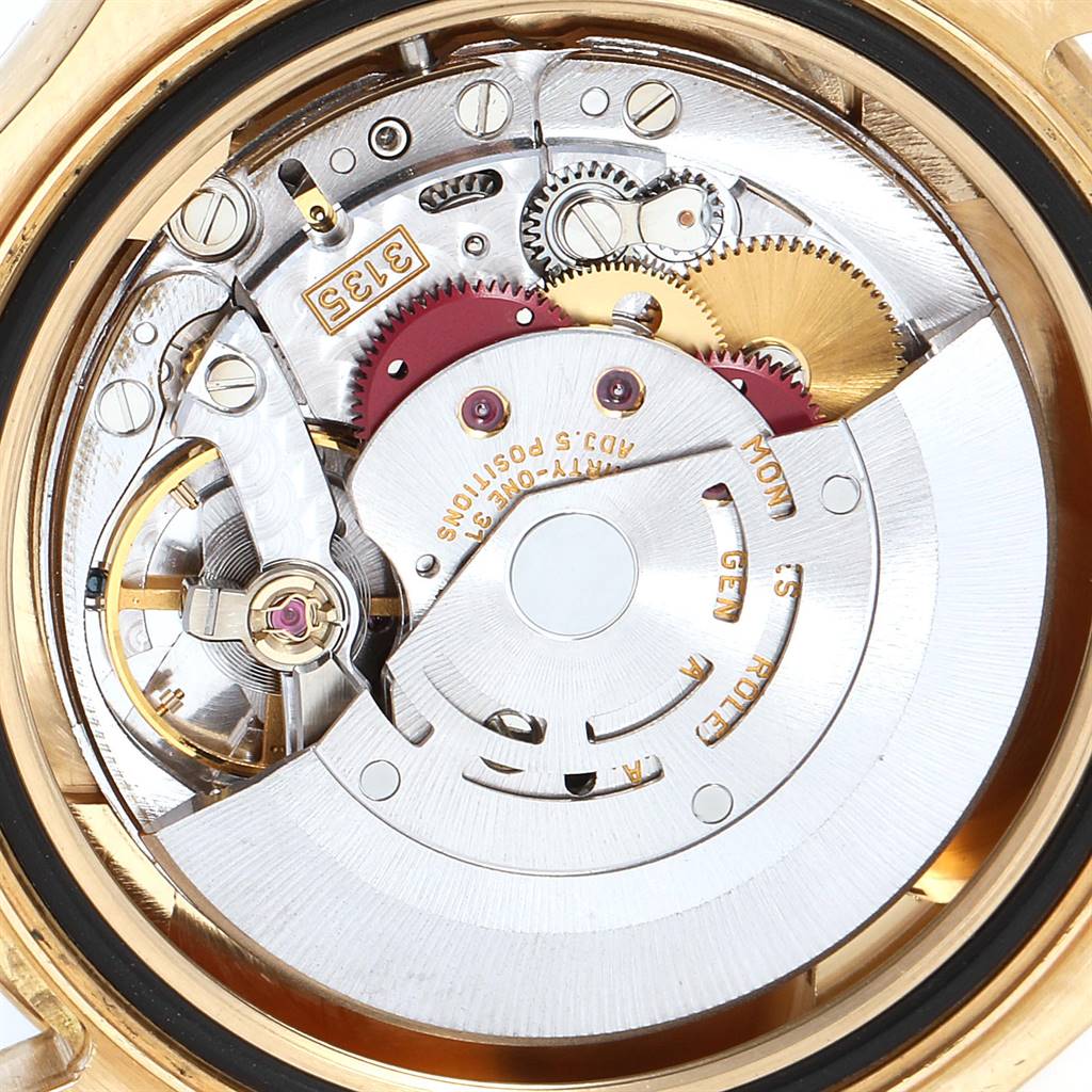 The image shows the movement mechanism of a Rolex Yacht-Master 16628 Men's Yellow Gold White Dial 16628 Men's Yellow Gold White Dial watch from the back case angle.