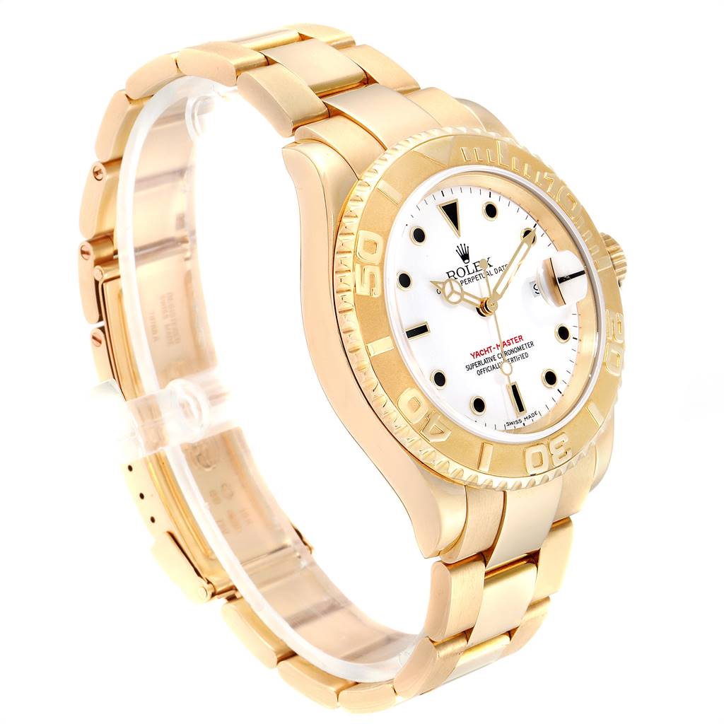 The image shows a side-angle view of a Rolex Yacht-Master 16628 Men's Yellow Gold White Dial 16628 Men's Yellow Gold White Dial watch, highlighting the gold bracelet, bezel, and white dial.