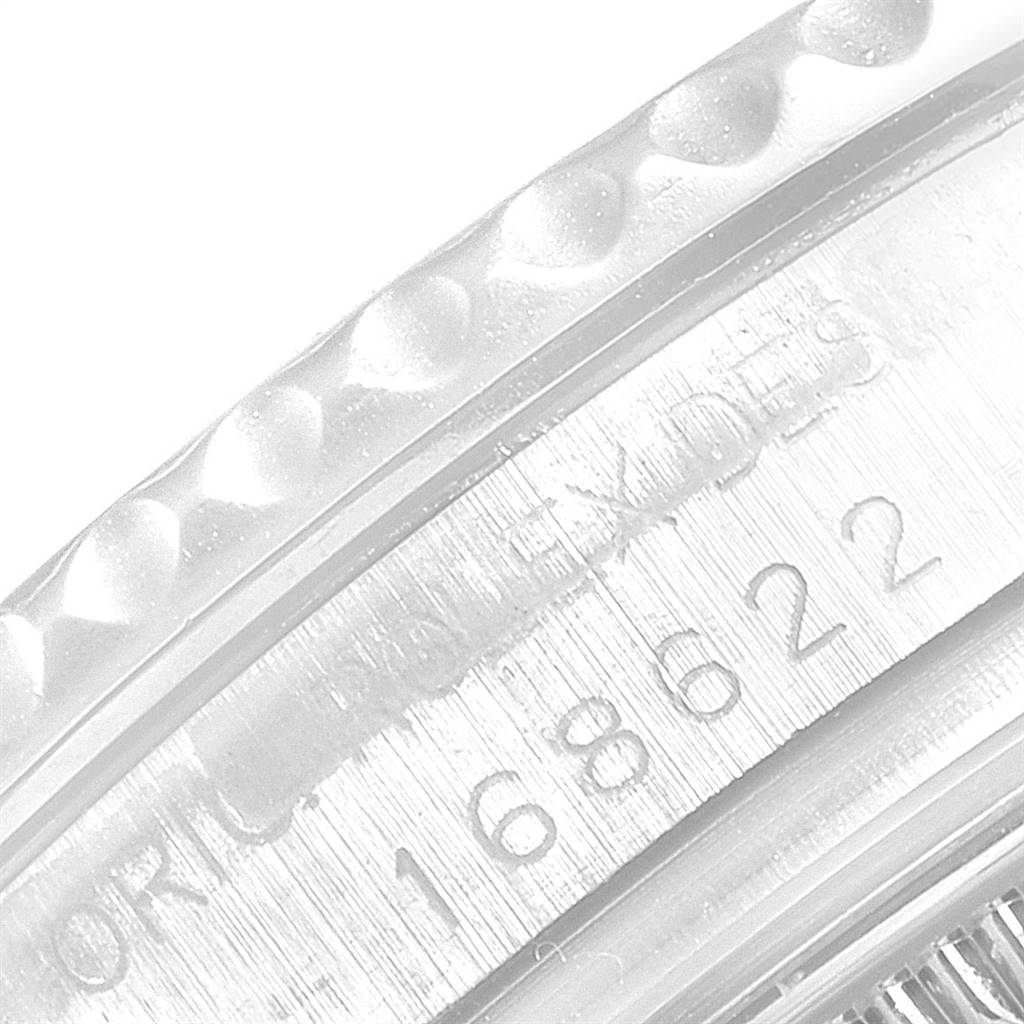 This close-up image features the bezel and serial number engraving of a Rolex Yacht-Master 168622 Men
s Stainless Steel Silver Dial 168622 Men
s Stainless Steel Silver Dial watch.