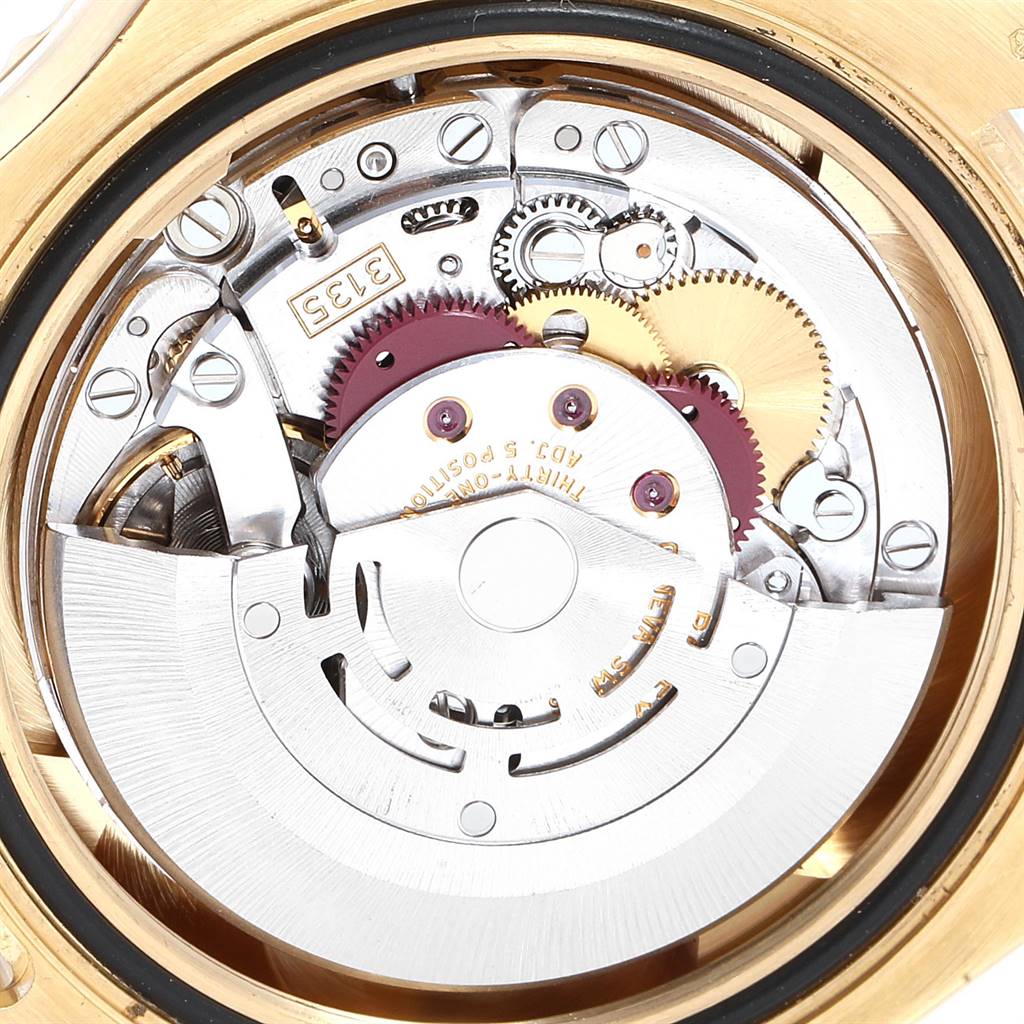 This image shows a close-up view of the movement inside a Rolex Yacht-Master 16628 Men's Yellow Gold Mother of Pearl Dial 16628 Men's Yellow Gold Mother of Pearl Dial watch, displaying the intricate gears and mechanisms.