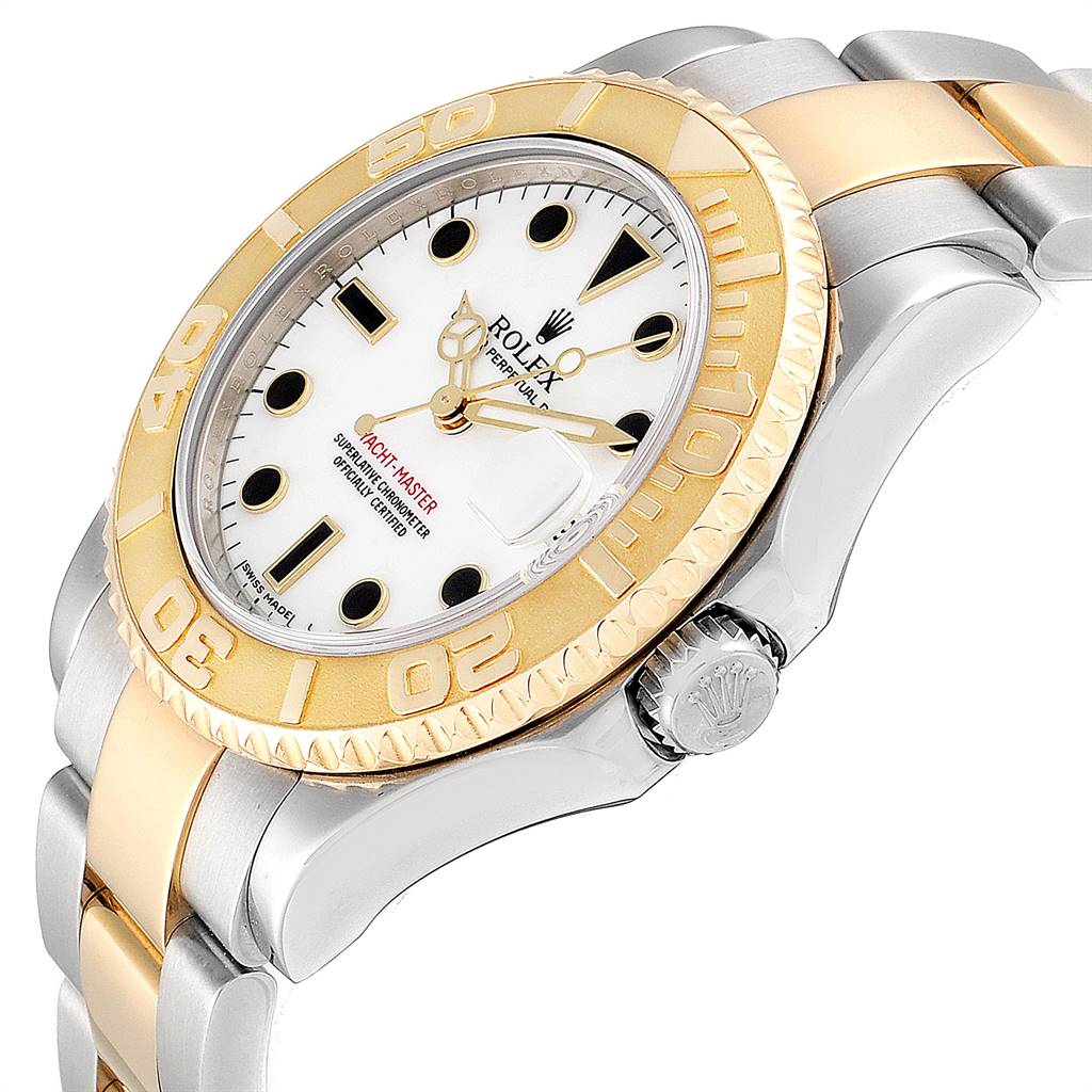 This image shows a close-up angled view of a Rolex Yacht-Master 168623 Men's Steel and Gold (two tone) White Dial 168623 Men's Steel and Gold (two tone) White Dial featuring its dial, bezel, crown, and part of the bracelet.