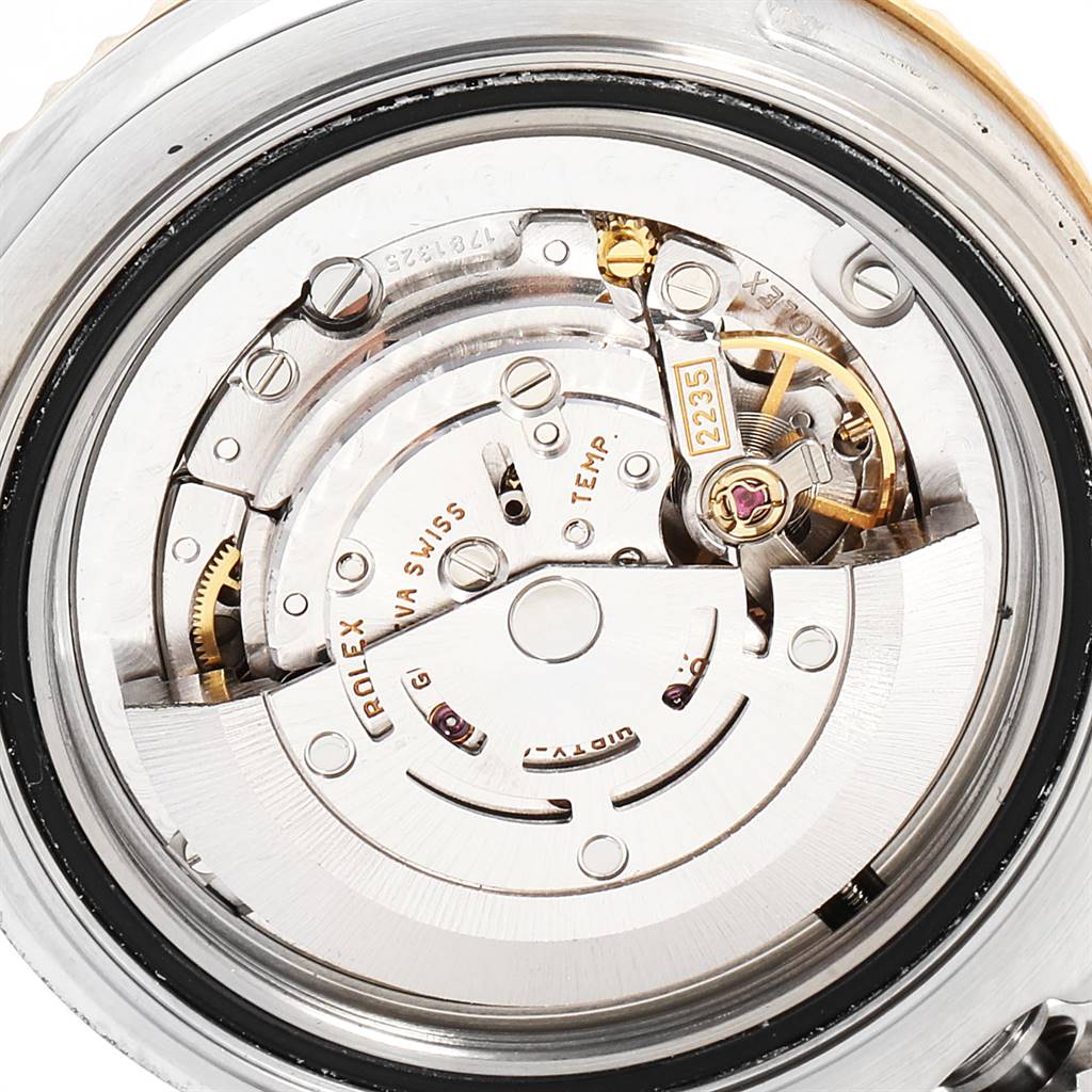 This is a close-up view of the internal mechanism of a Rolex Yacht-Master 168623 Men
s Steel and Gold (two tone) Mother of Pearl Dial 168623 Men
s Steel and Gold (two tone) Mother of Pearl Dial watch.