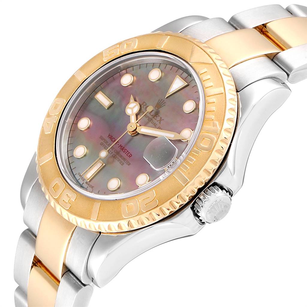 The image shows a close-up of the dial, bezel, and part of the bracelet of a Rolex Yacht-Master 168623 Men
s Steel and Gold (two tone) Mother of Pearl Dial 168623 Men
s Steel and Gold (two tone) Mother of Pearl Dial watch.