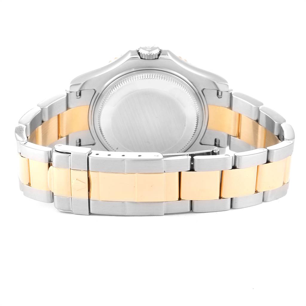 The image shows the back view of a Rolex Yacht-Master 168623 Men
s Steel and Gold (two tone) Mother of Pearl Dial 168623 Men
s Steel and Gold (two tone) Mother of Pearl Dial watch, highlighting its two-tone stainless steel and gold bracelet.