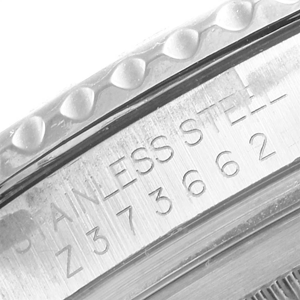 This close-up angle shows the engraving on the case back of a Rolex Yacht-Master 16622 Men
s Stainless Steel Silver Dial 16622 Men
s Stainless Steel Silver Dial watch, highlighting the stainless steel material and serial number.