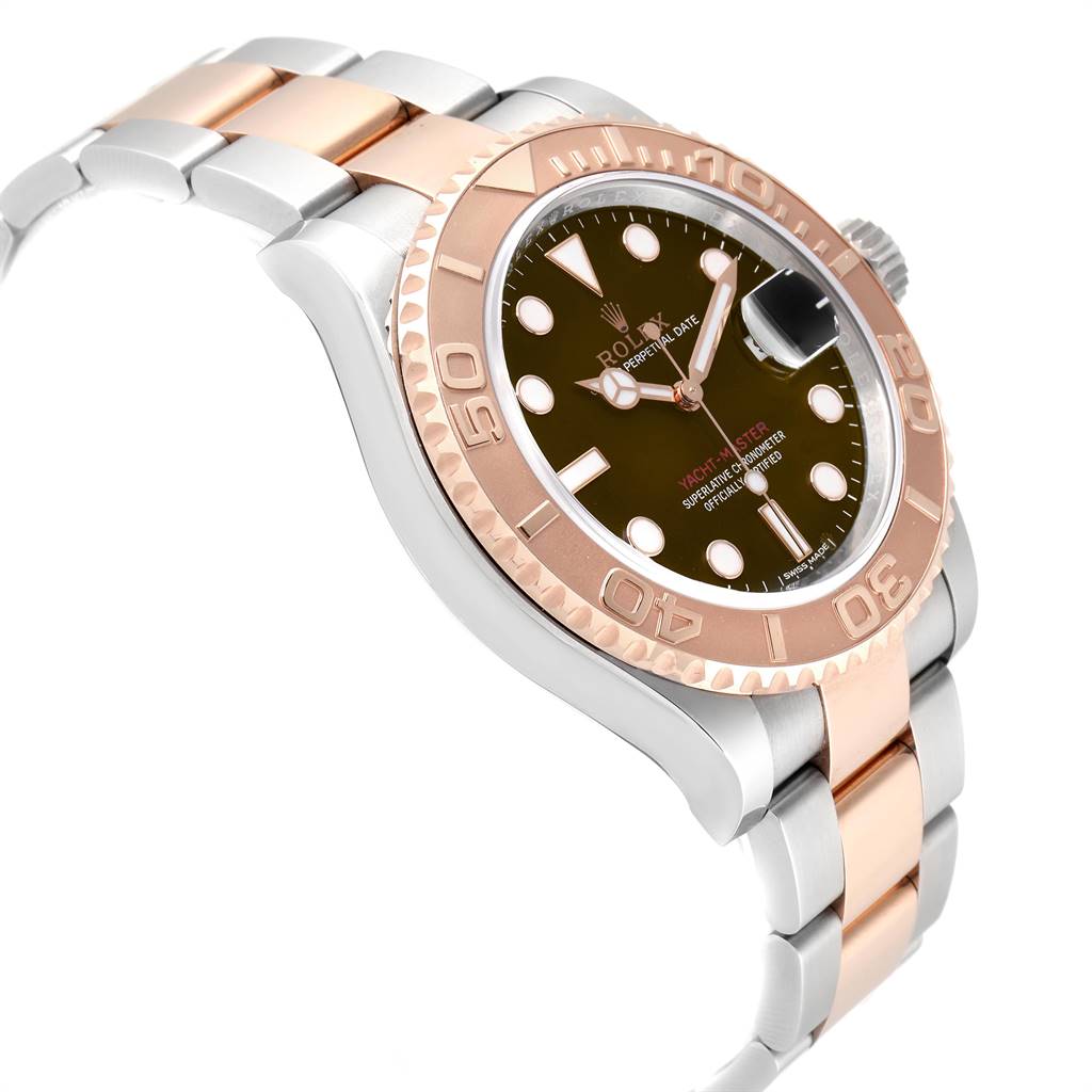 The image shows a side angle of a Rolex Yacht-Master 116621 Men's Stainless Steel Brown Dial 116621 Men's Stainless Steel Brown Dial watch, highlighting its bezel, dial, and two-tone bracelet.
