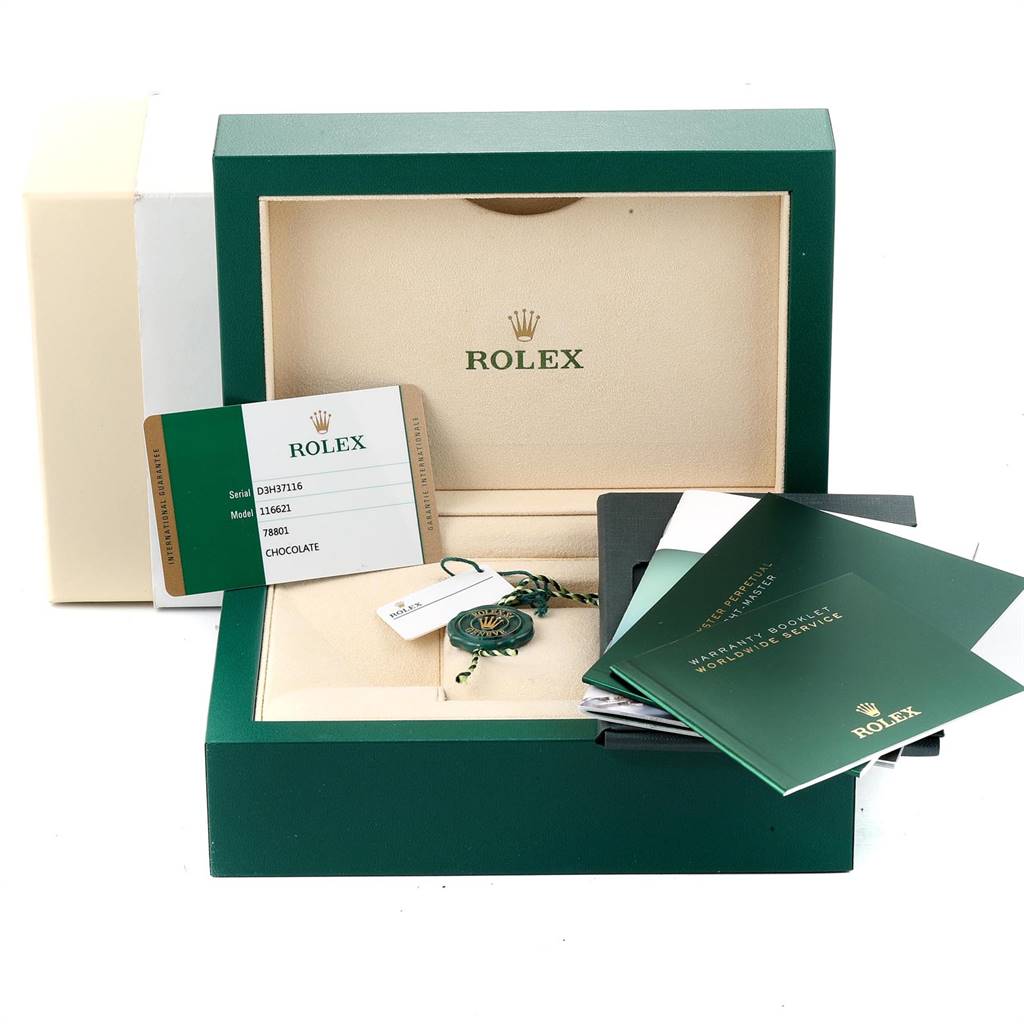 The image shows a Rolex Yacht-Master 116621 Men's Stainless Steel Brown Dial 116621 Men's Stainless Steel Brown Dial watch box, warranty card, tags, and manuals from a slightly elevated front angle.