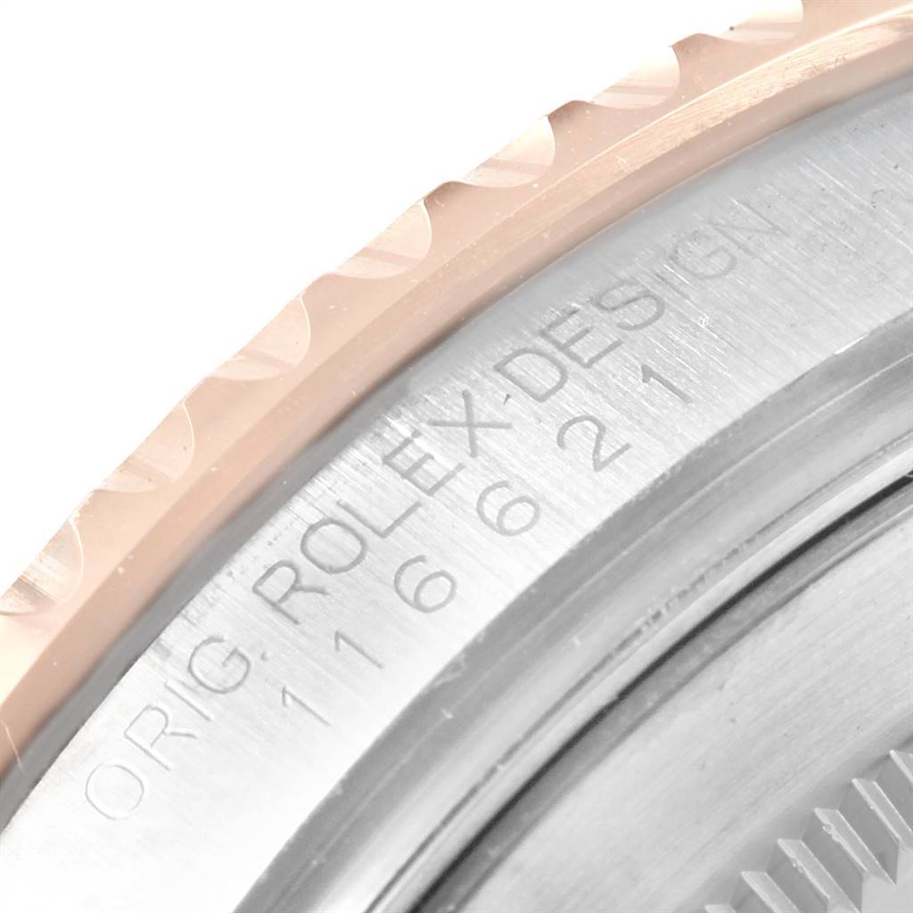 The image shows a close-up of the bezel and engraved outer rim of a Rolex Yacht-Master 116621 Men's Stainless Steel Brown Dial 116621 Men's Stainless Steel Brown Dial watch.